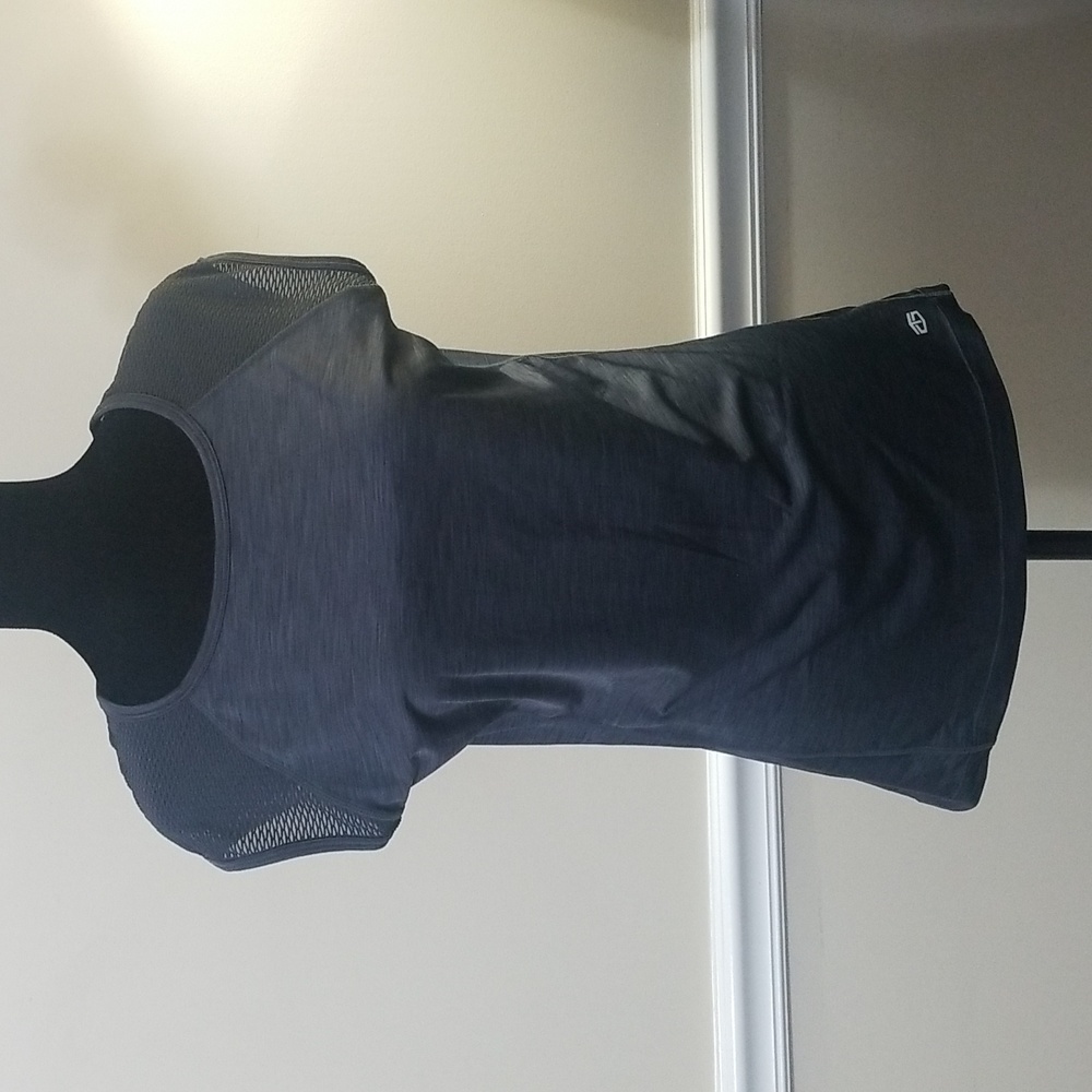 Tap Out Sleeveless Activewear Shirt